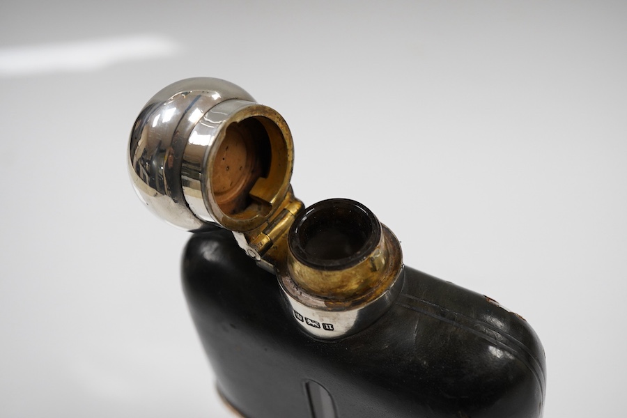 An Edwardian silver and leather mounted glass hip flask, by G & J W Hawksley, Sheffield, 1905/1906, 14.3cm, with engraved initials.